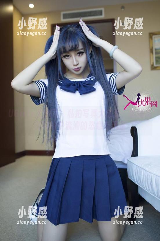 UGirls尤果网 - 私拍写真大放送：信悦儿在网袜中流淌的恣意与风情